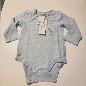 Brand new with tags. Blara Organic. Size 9-12m. Long sleeve onesie.
